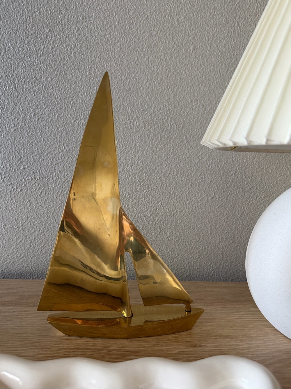 Brass sailboat decor